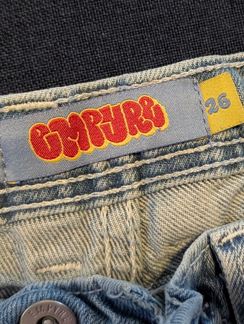 EMPYRE  Brand, Size 26,  Light Blue Jeans with Red & Yellow Patch